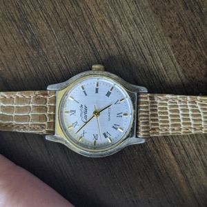 Vintage Cartier silver and gold watch with brown band